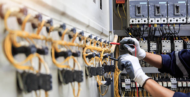 Professional Electrician technician working in Audubon, IA